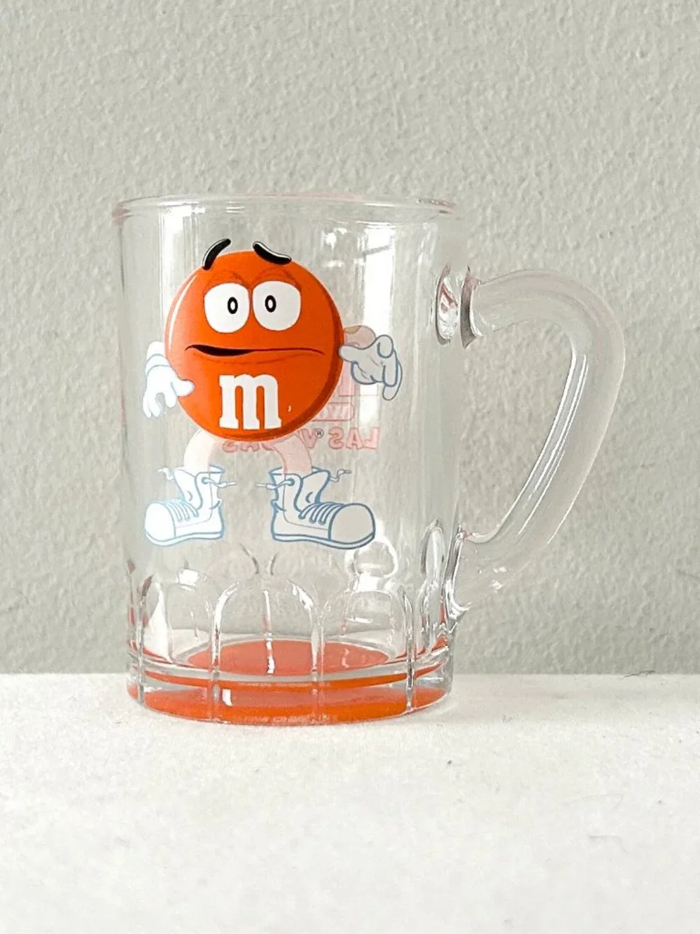 M&M’s World Las Vegas Orange Shot Glass Miniature Mug Souvenir Arc France